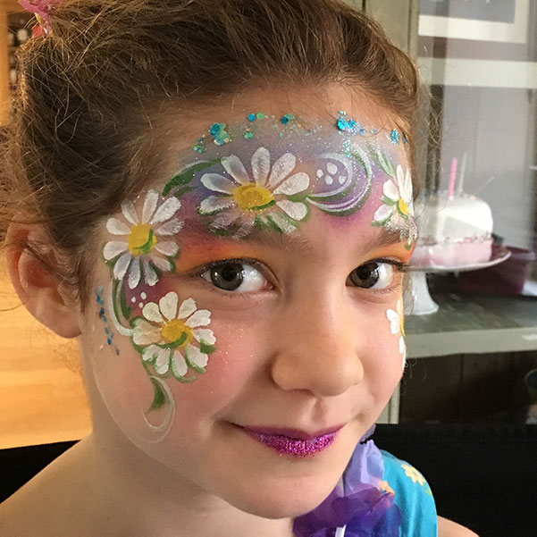 Facepaint girl face with flower design